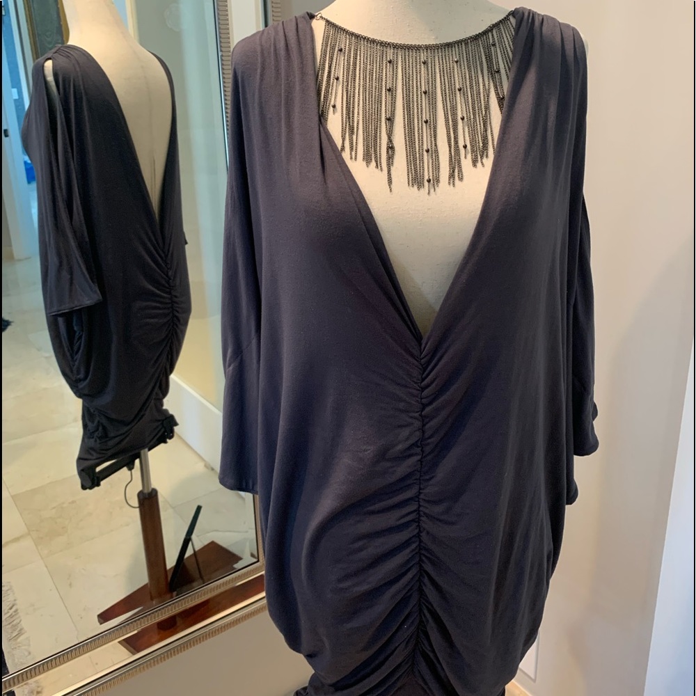 V neck very low knit dress with neckline chain accent